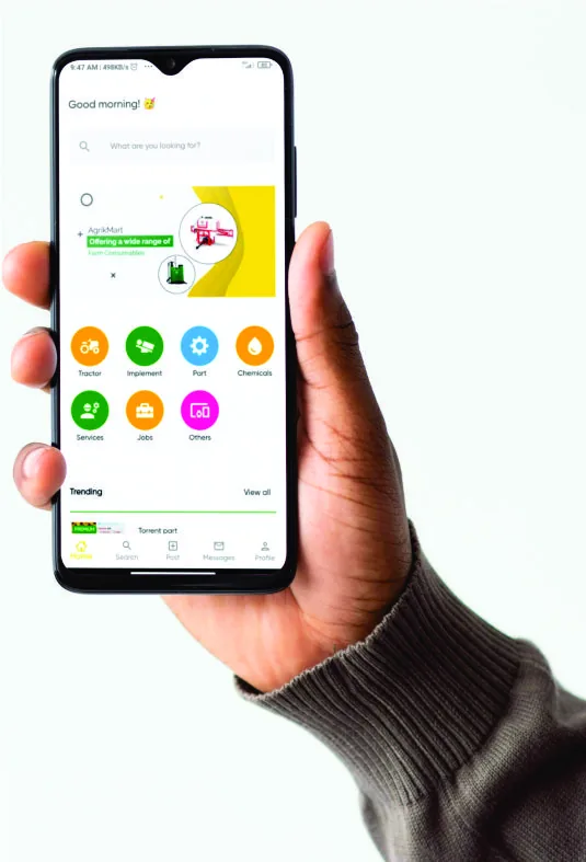 The AgrikMart marketplace app open on a phone held in one hand